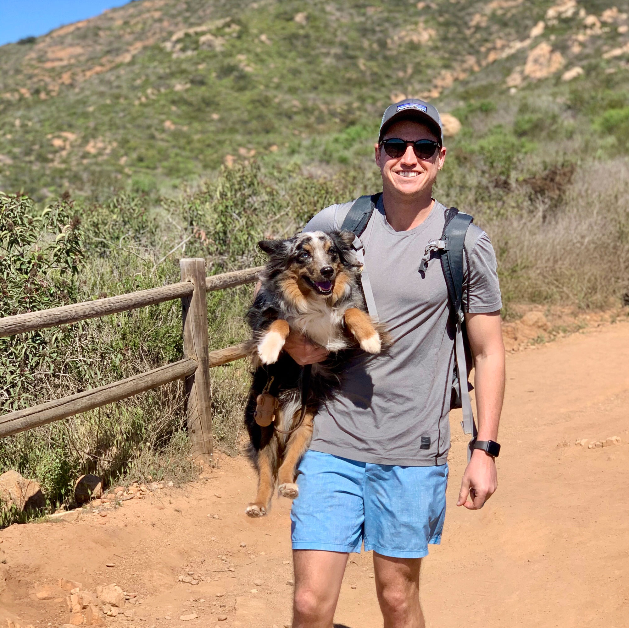 Michael Muna hiking with his dog